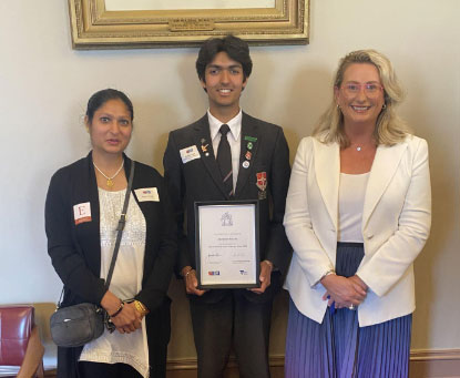 Devansh and his mother with Sarah Connolly MP at Parliament House